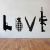 Seinätarra Banksy Love Weapons